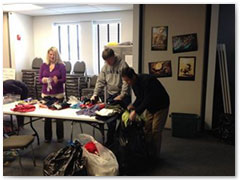 Volunteers from North America sorted over 130 bags of clothing at the Trinity United Methodist Church Thrift Shop in New Jersey